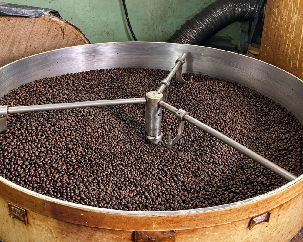 Coffee bean roasting process at CAROMA beverage manufacturing facility in Malaysia